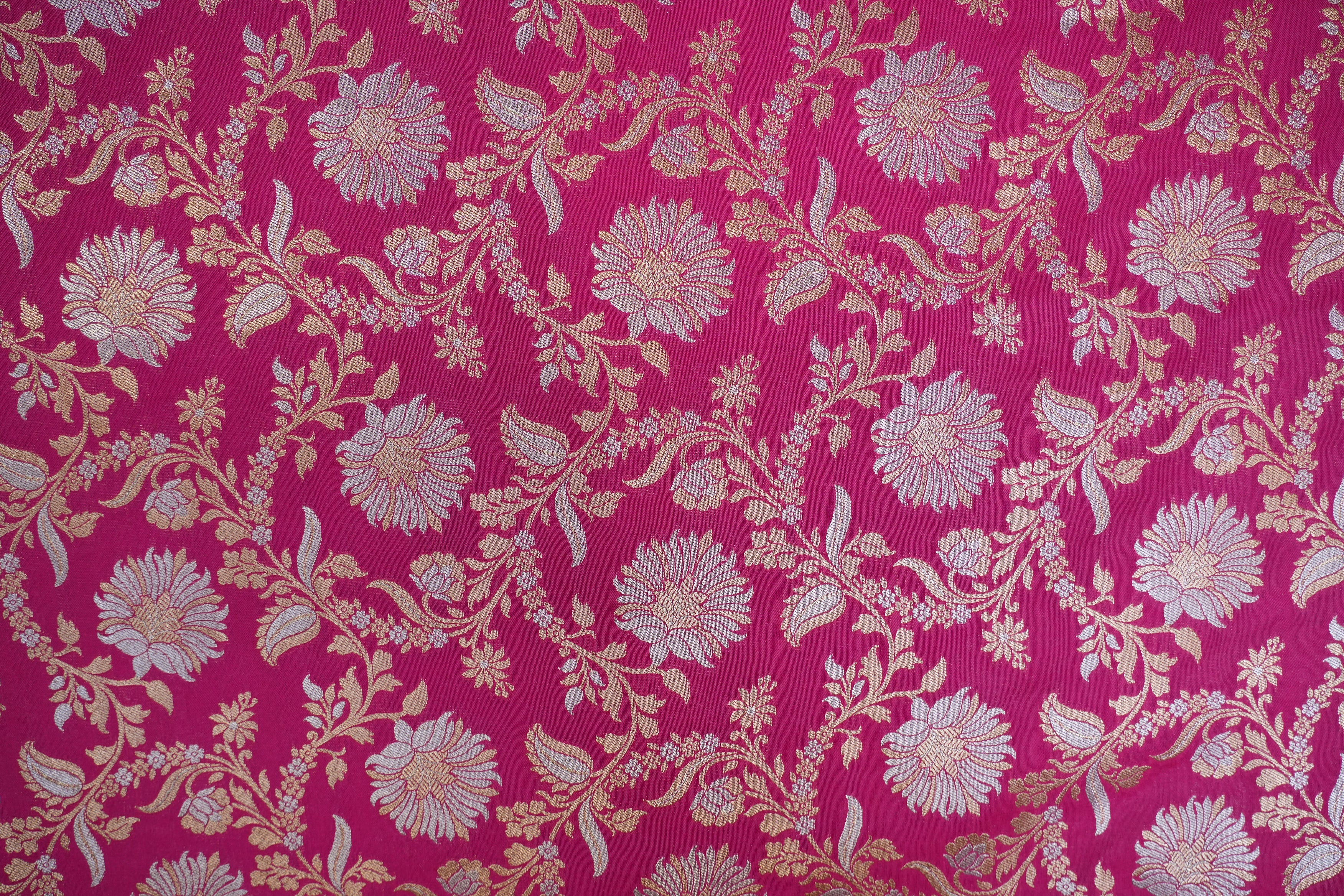 Rani pink colour banarasi brocade fabric with beautiful floral pattern