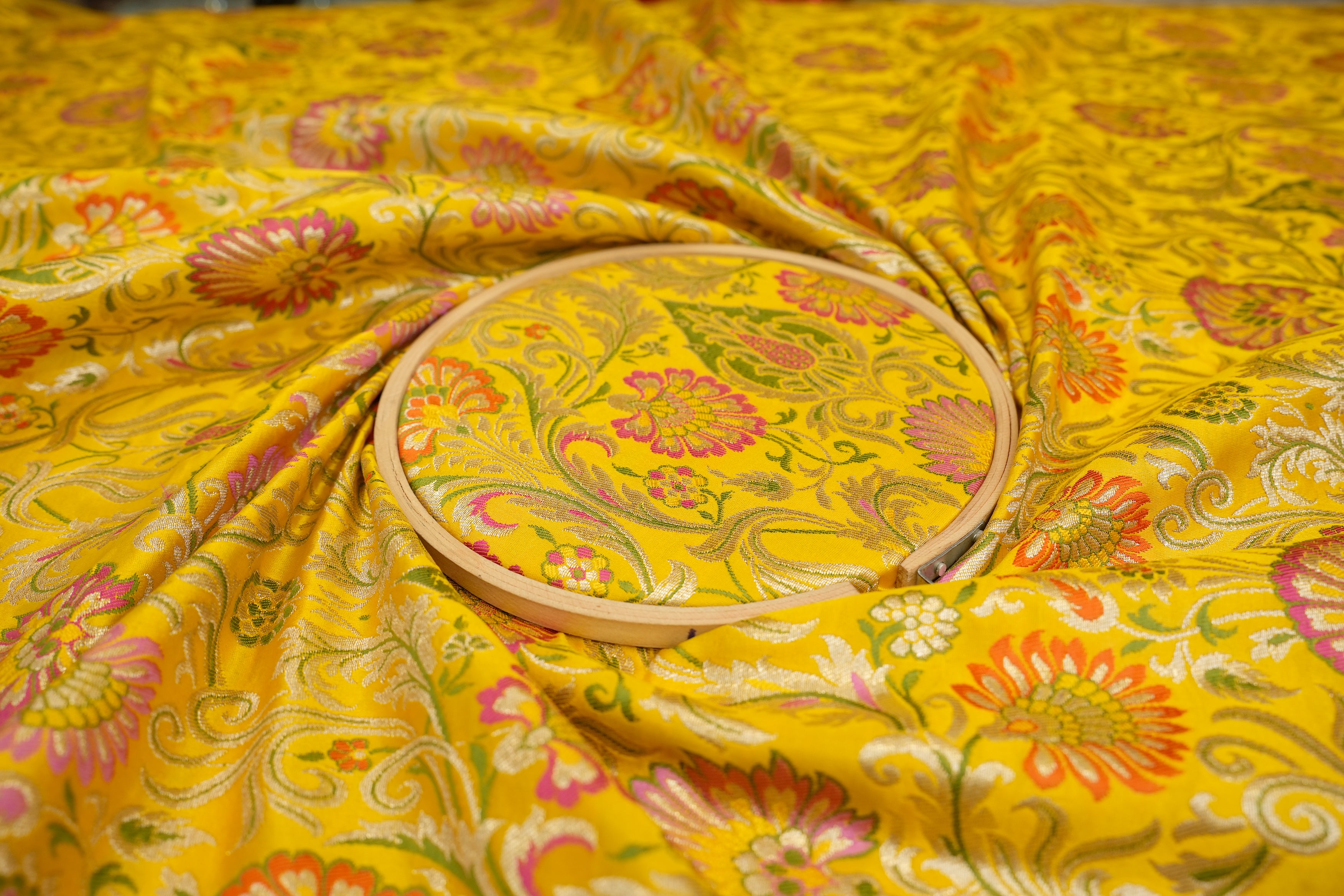 Yellow colour banarasi brocade fabric with beautiful floral pattern