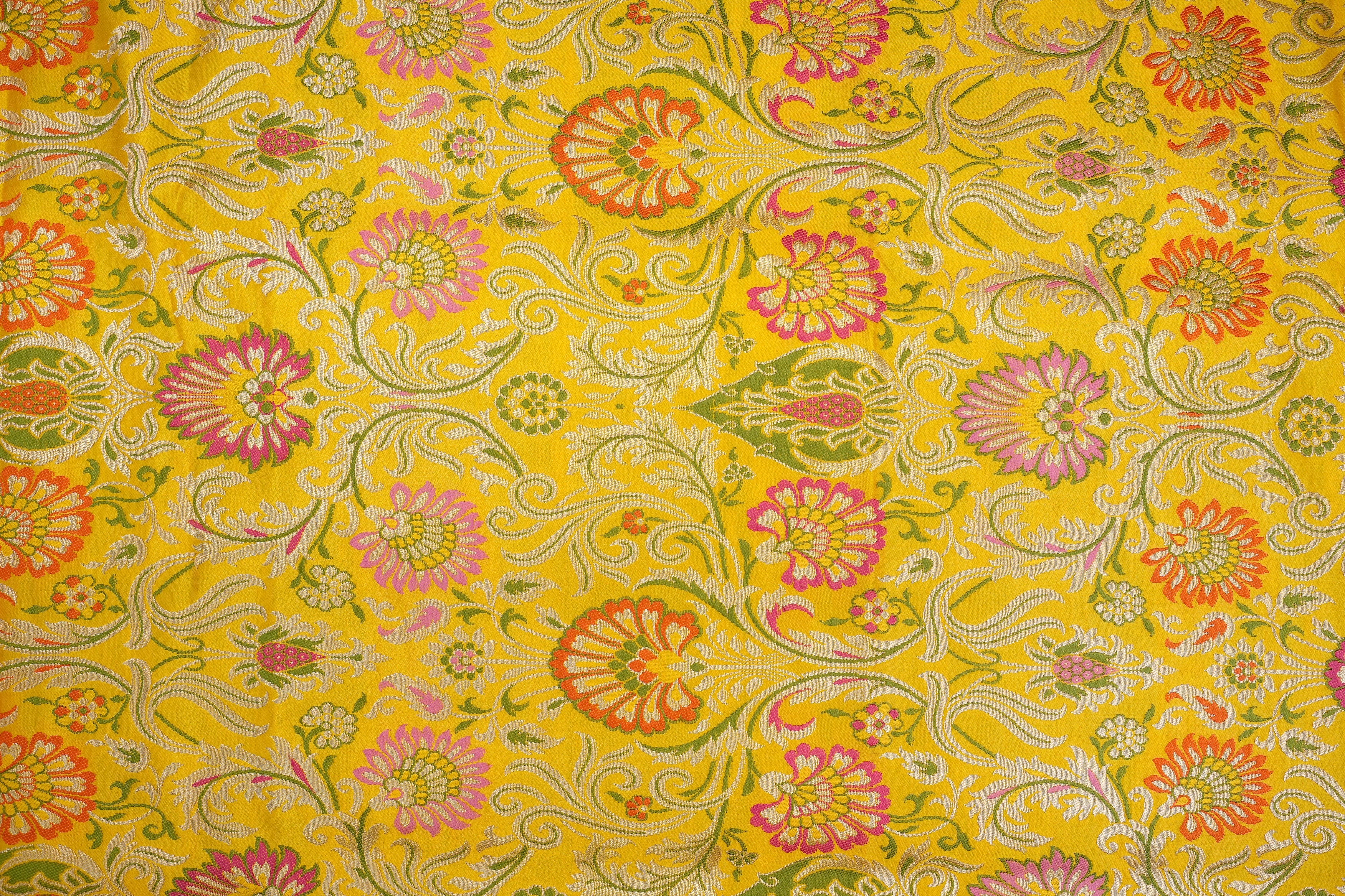 Yellow colour banarasi brocade fabric with beautiful floral pattern