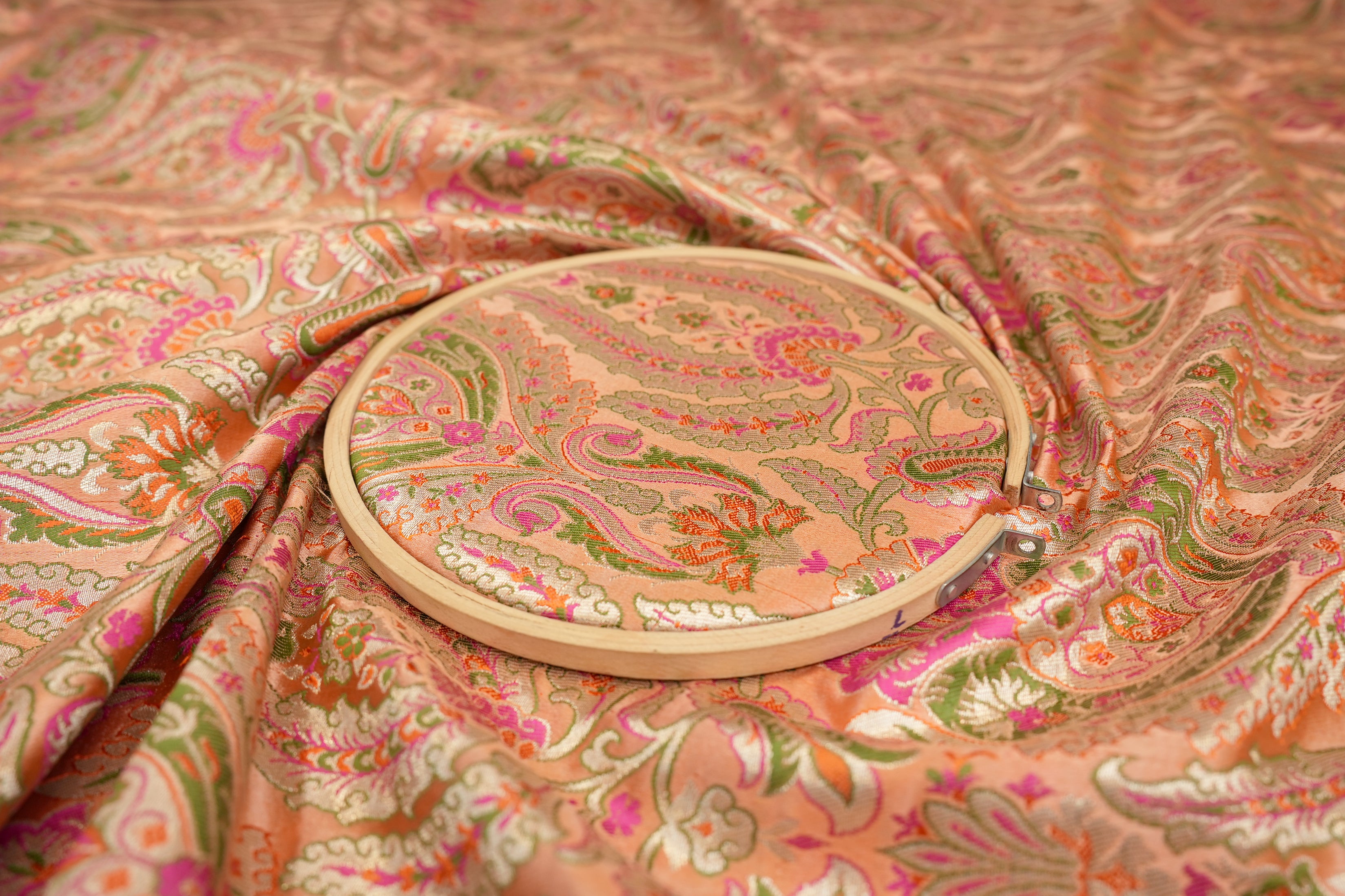 Peach colour banarasi brocade fabric with beautiful Traditional pattern