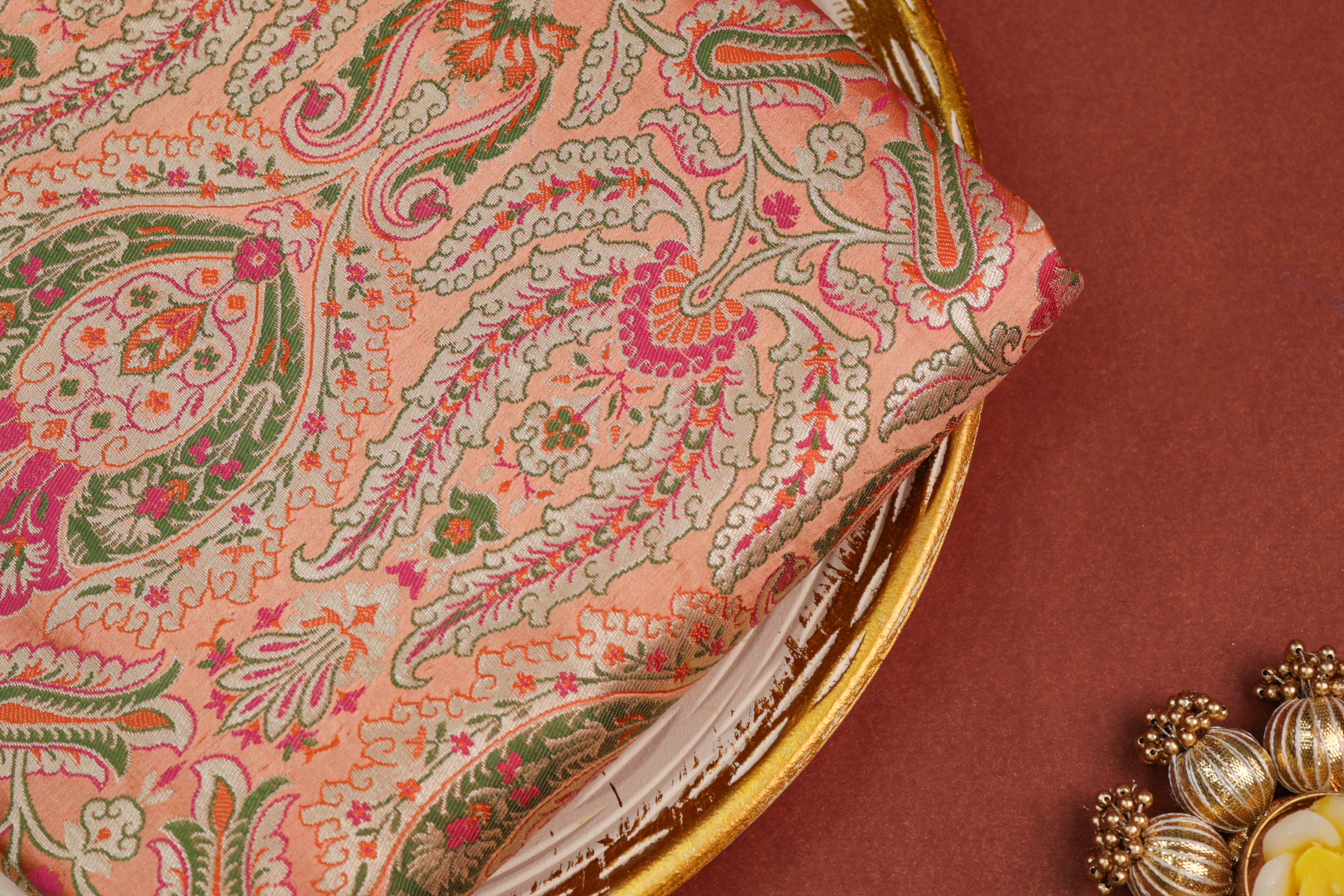 Peach colour banarasi brocade fabric with beautiful Traditional pattern