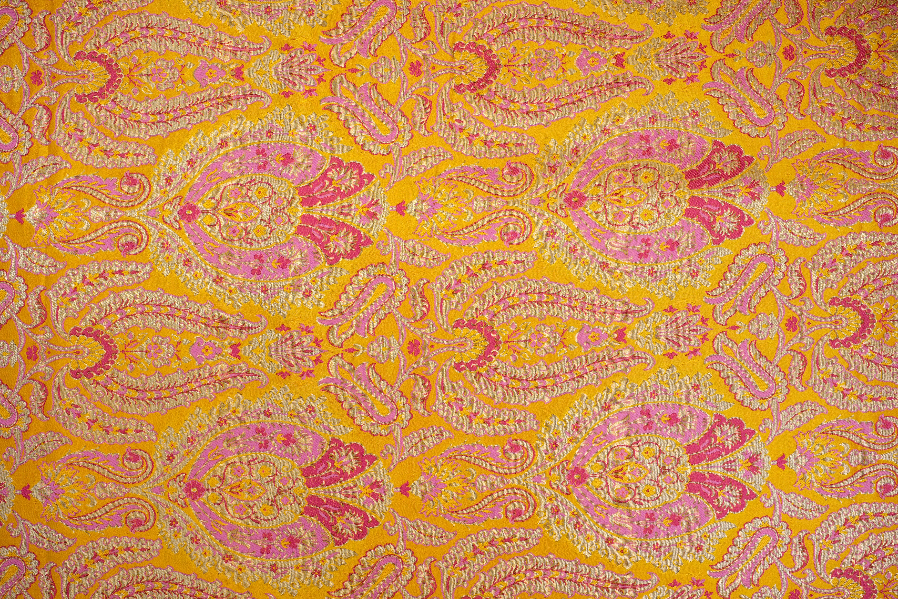 Yellow colour banarasi brocade fabric with beautiful floral pattern