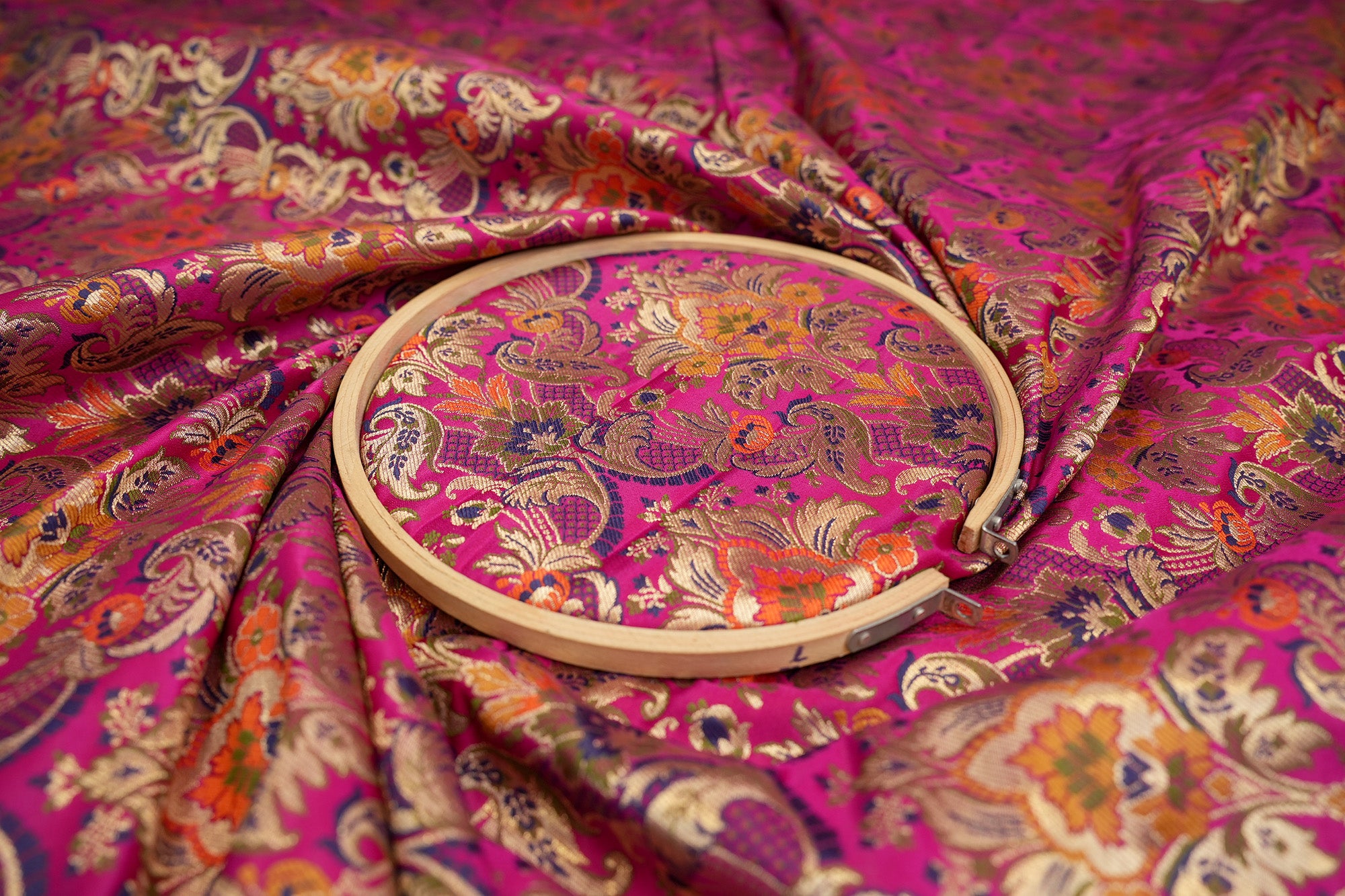 Magenta colour banarasi brocade fabric with beautiful Floral pattern