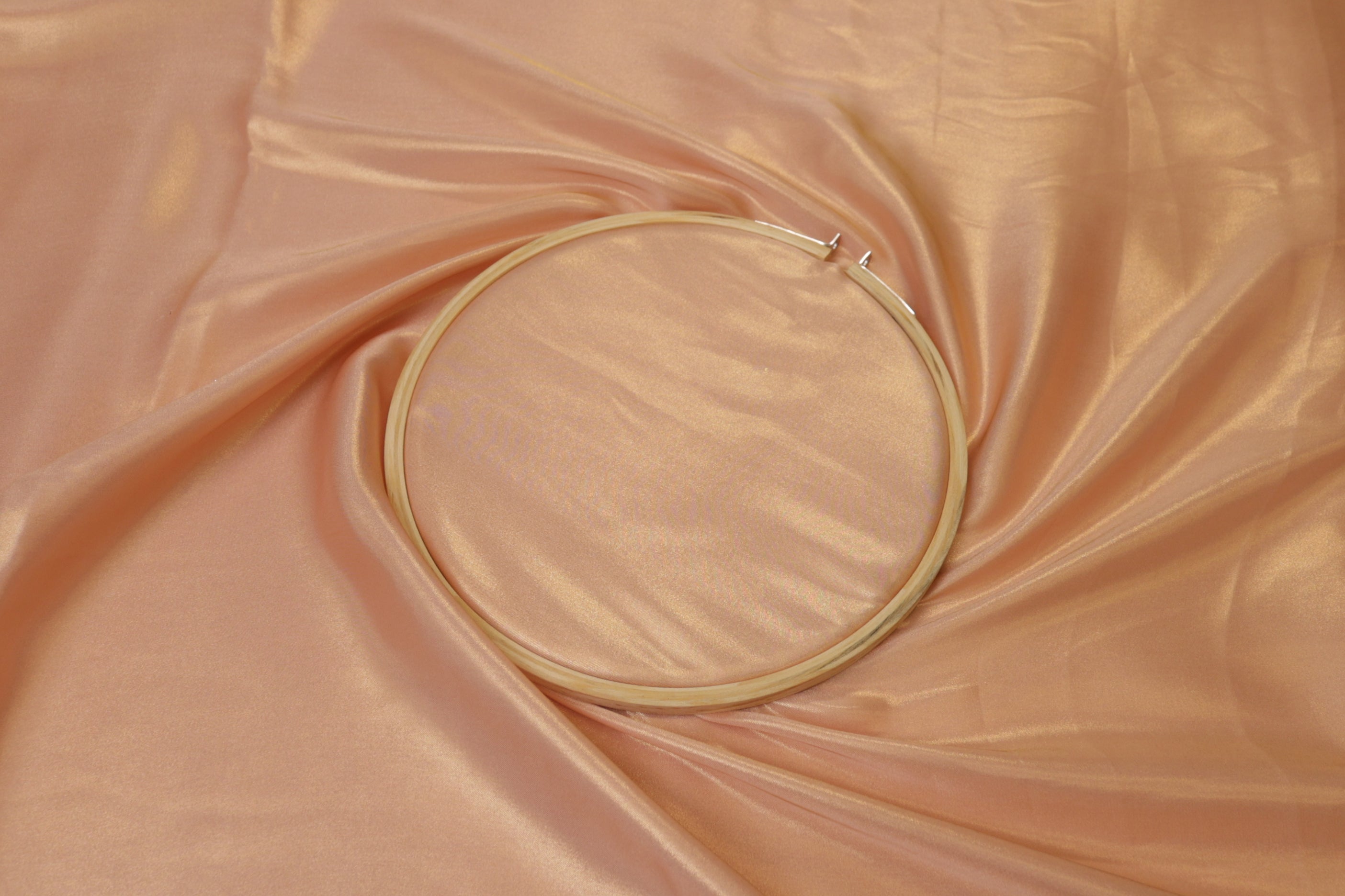 Pastel peach coloured shimmer georgette