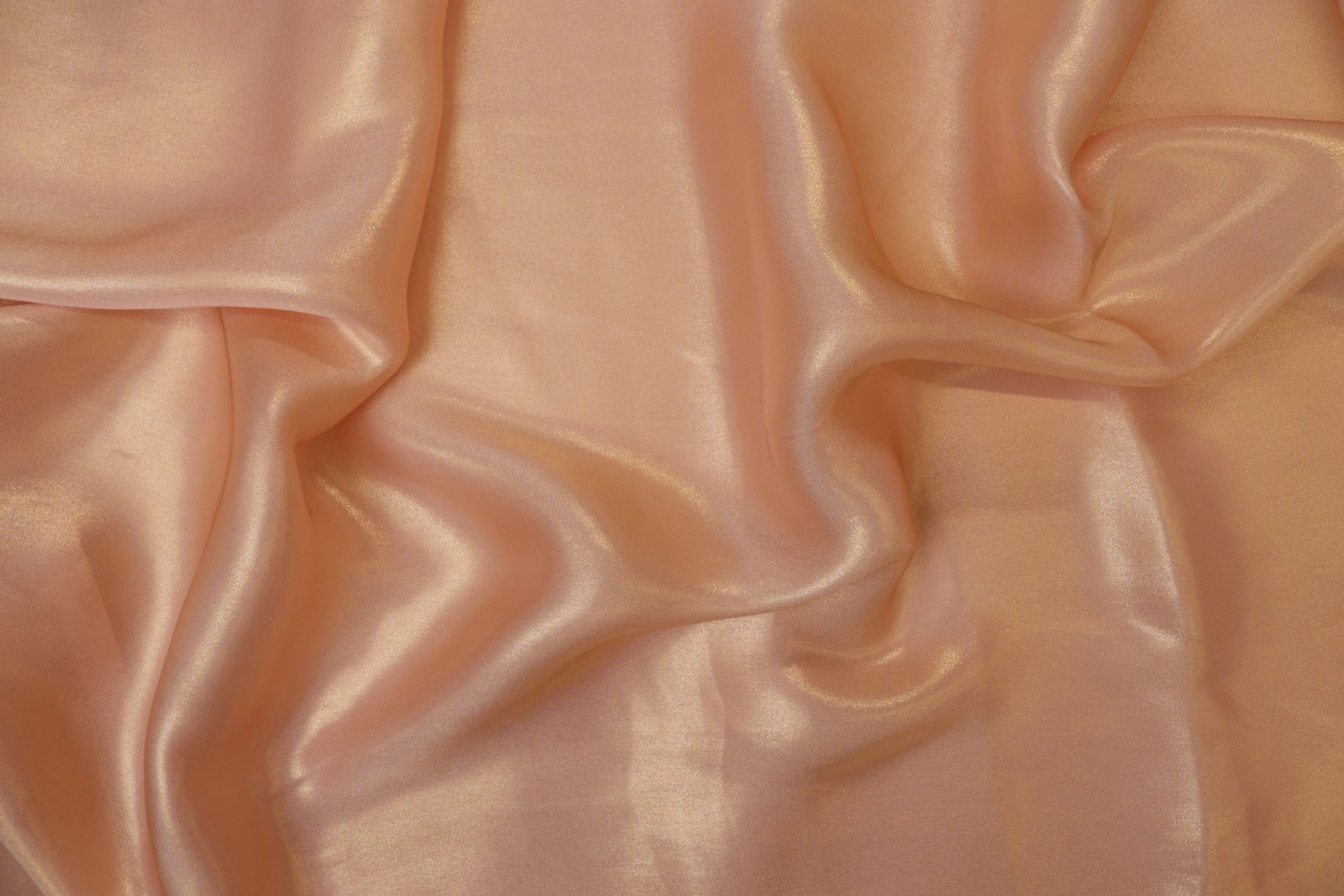 Pastel peach coloured shimmer georgette