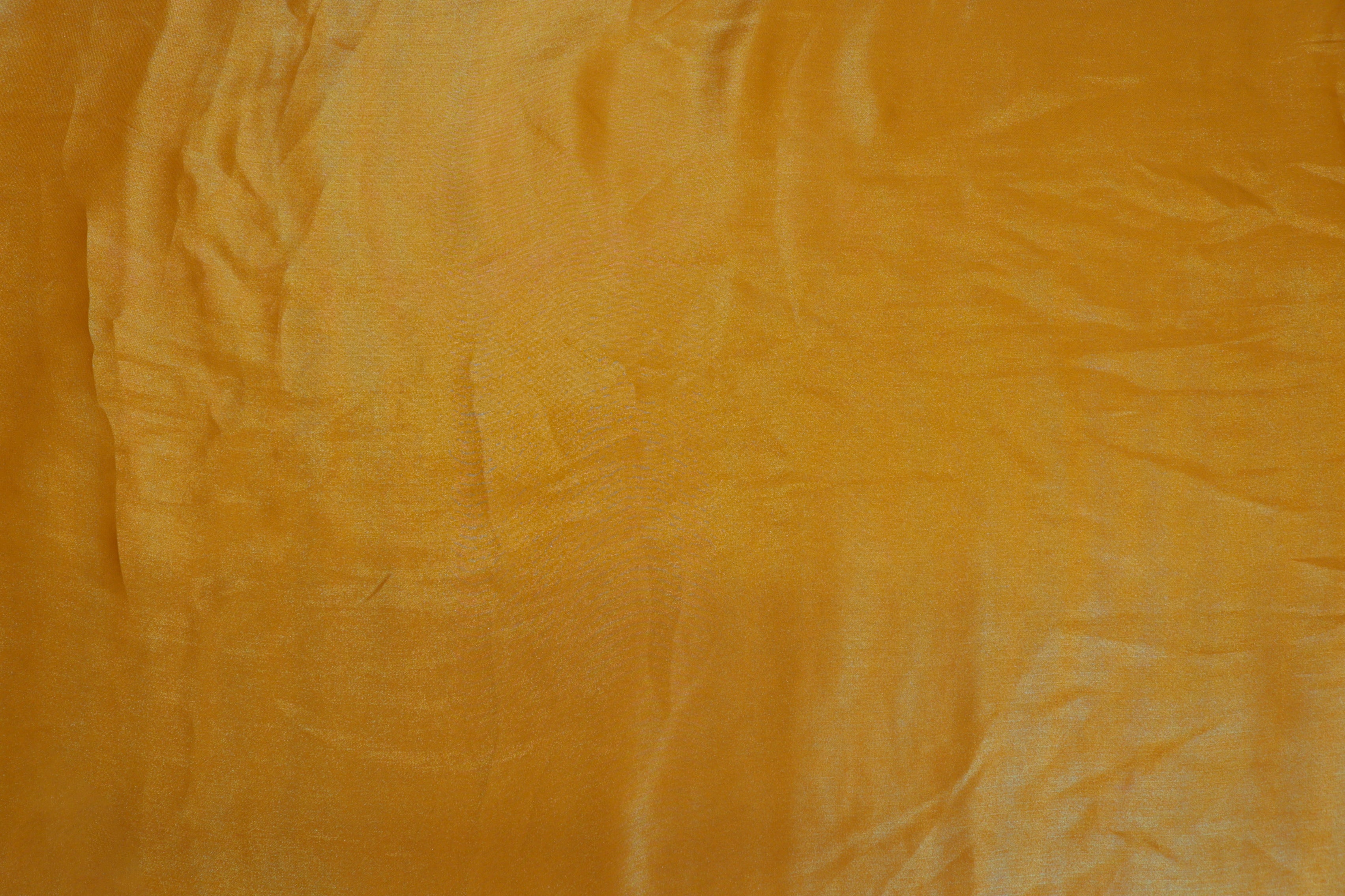 Saffron gold coloured shimmer georgette