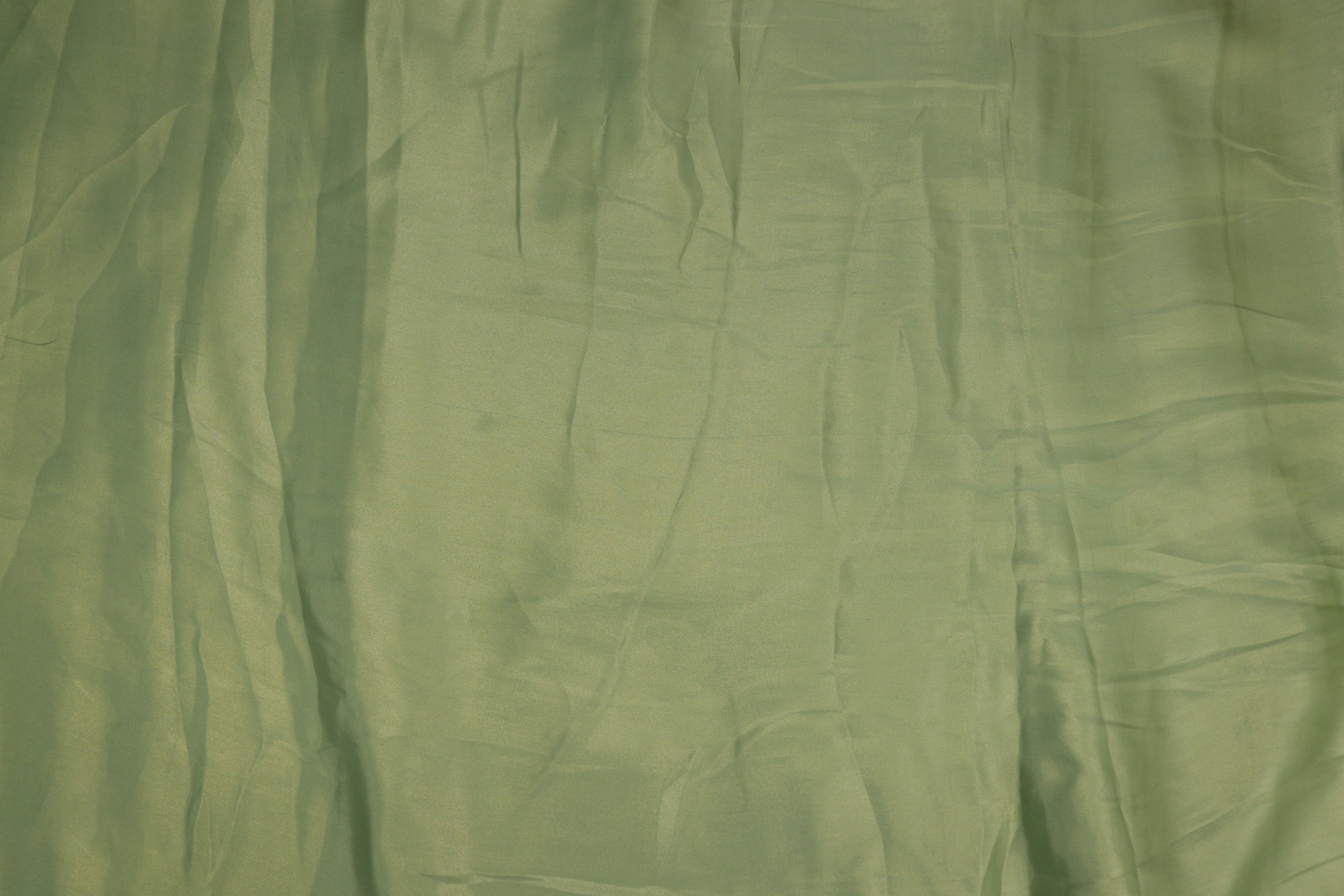 Pistachio green coloured shimmer georgette