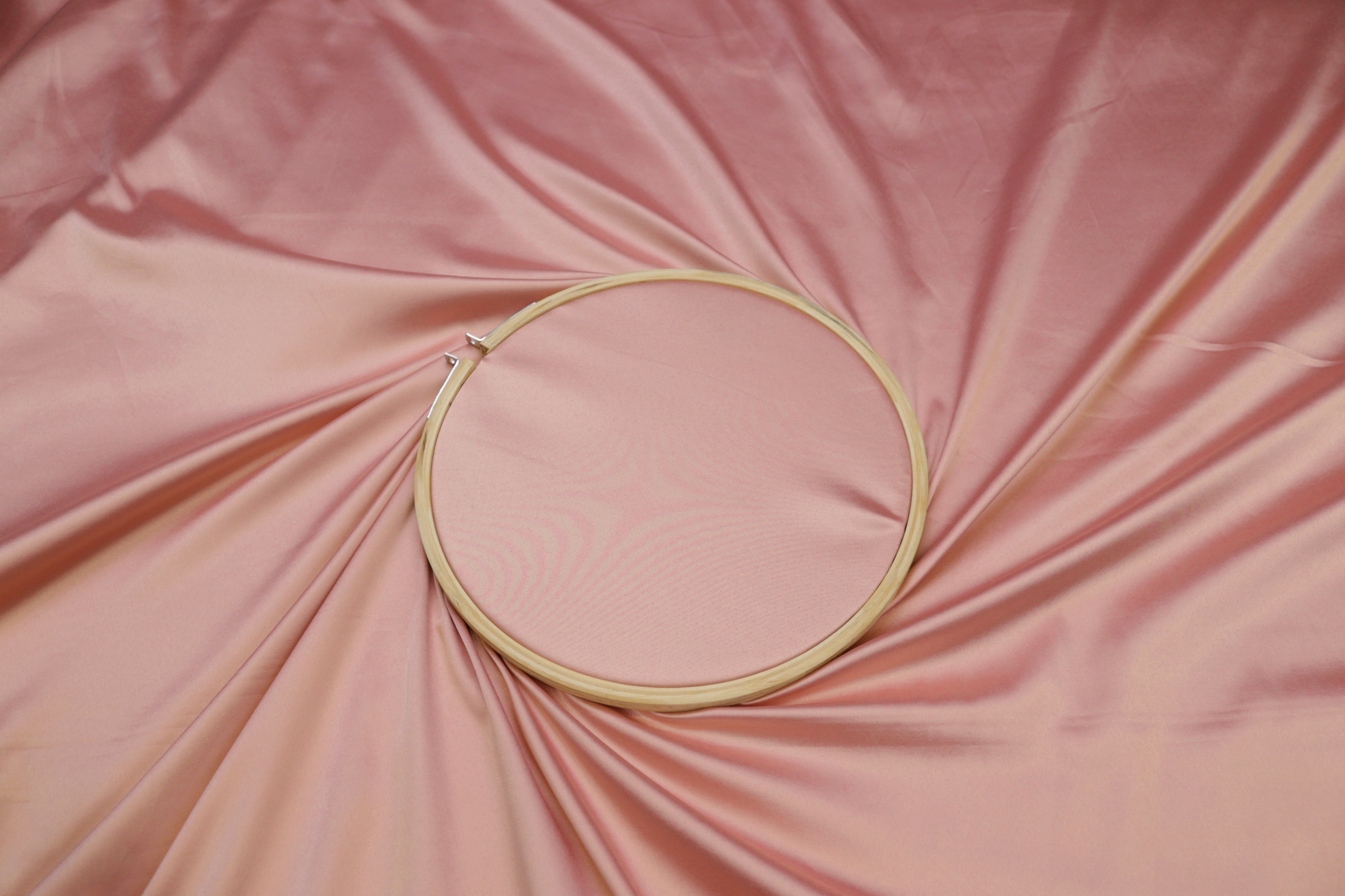 Peach pink colored royal satin