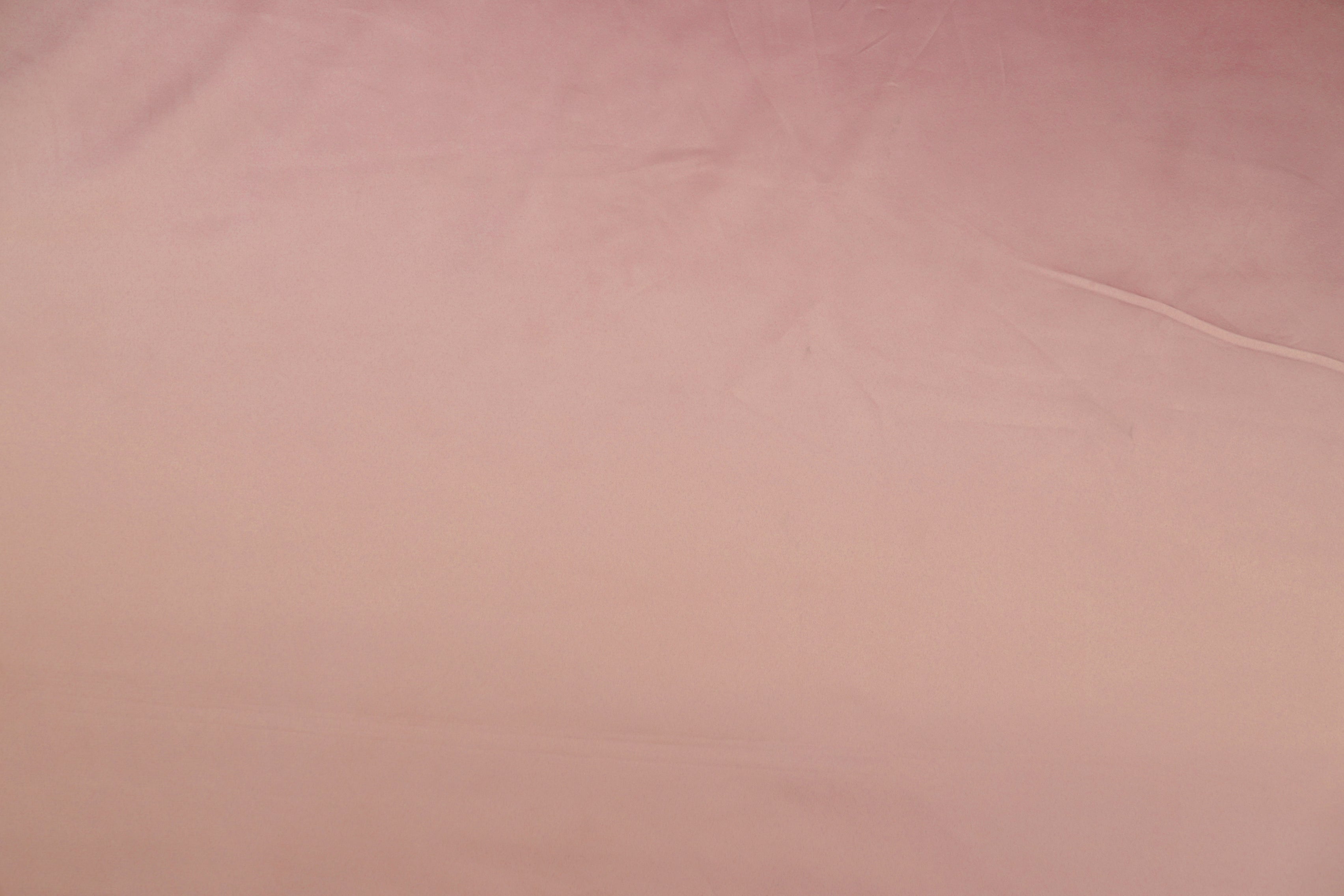 Peach pink colored royal satin