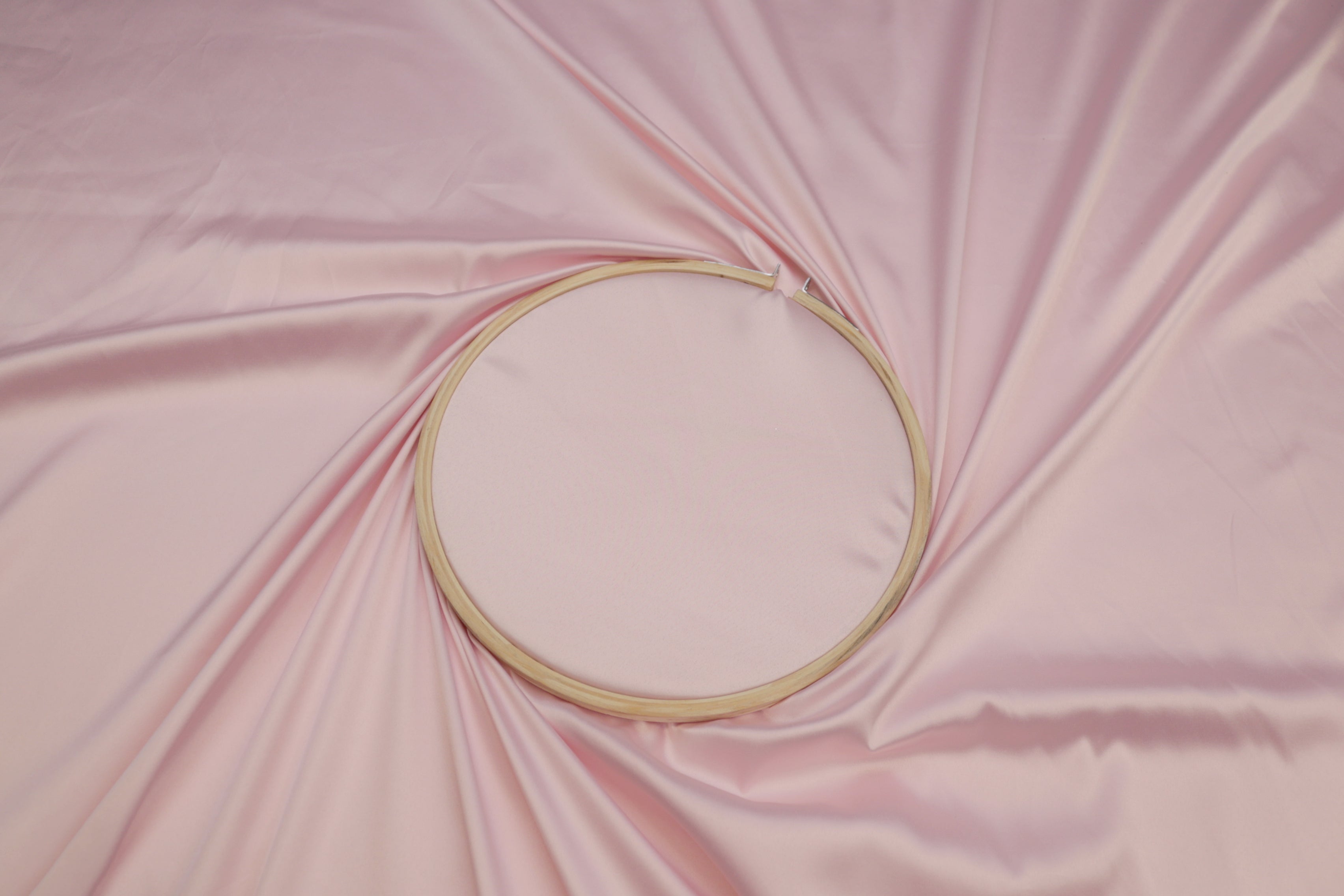 Pale light pink colored royal satin