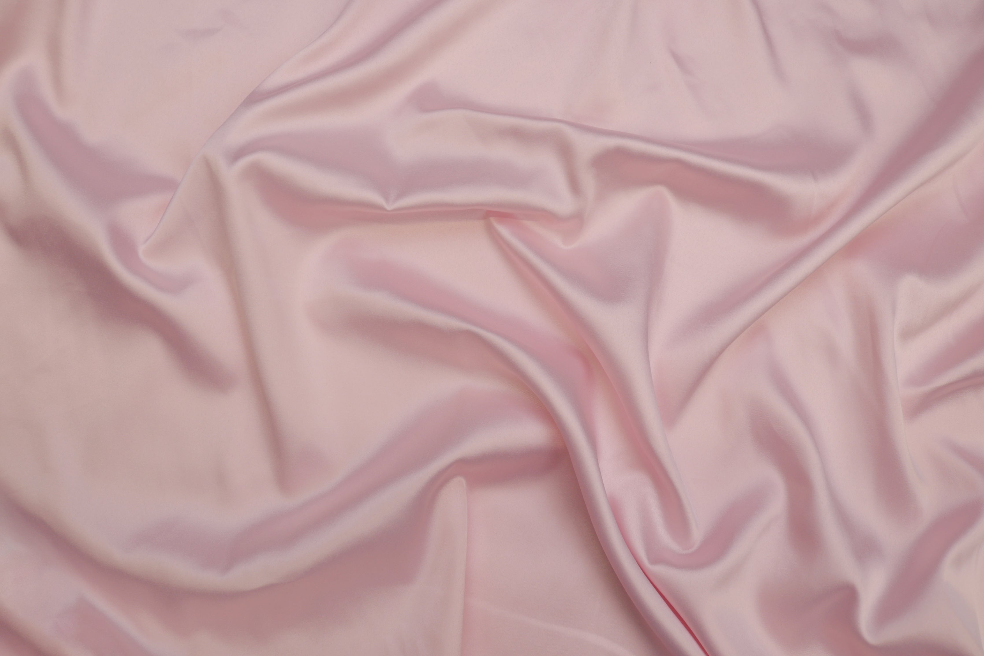 Pale light pink colored royal satin