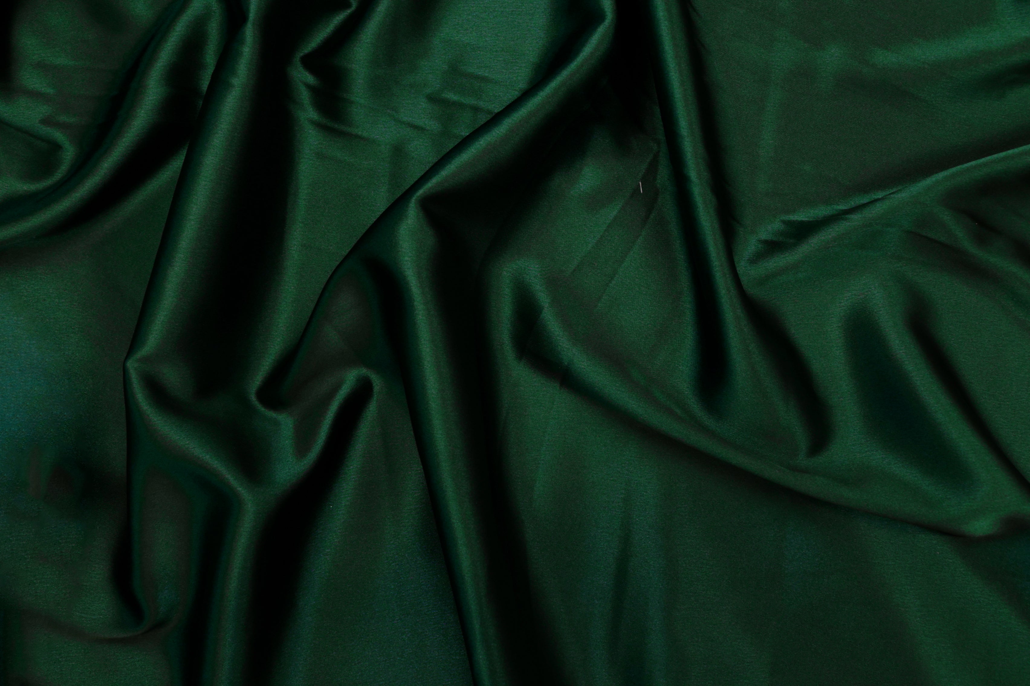 Dark jungle green colored royal satin