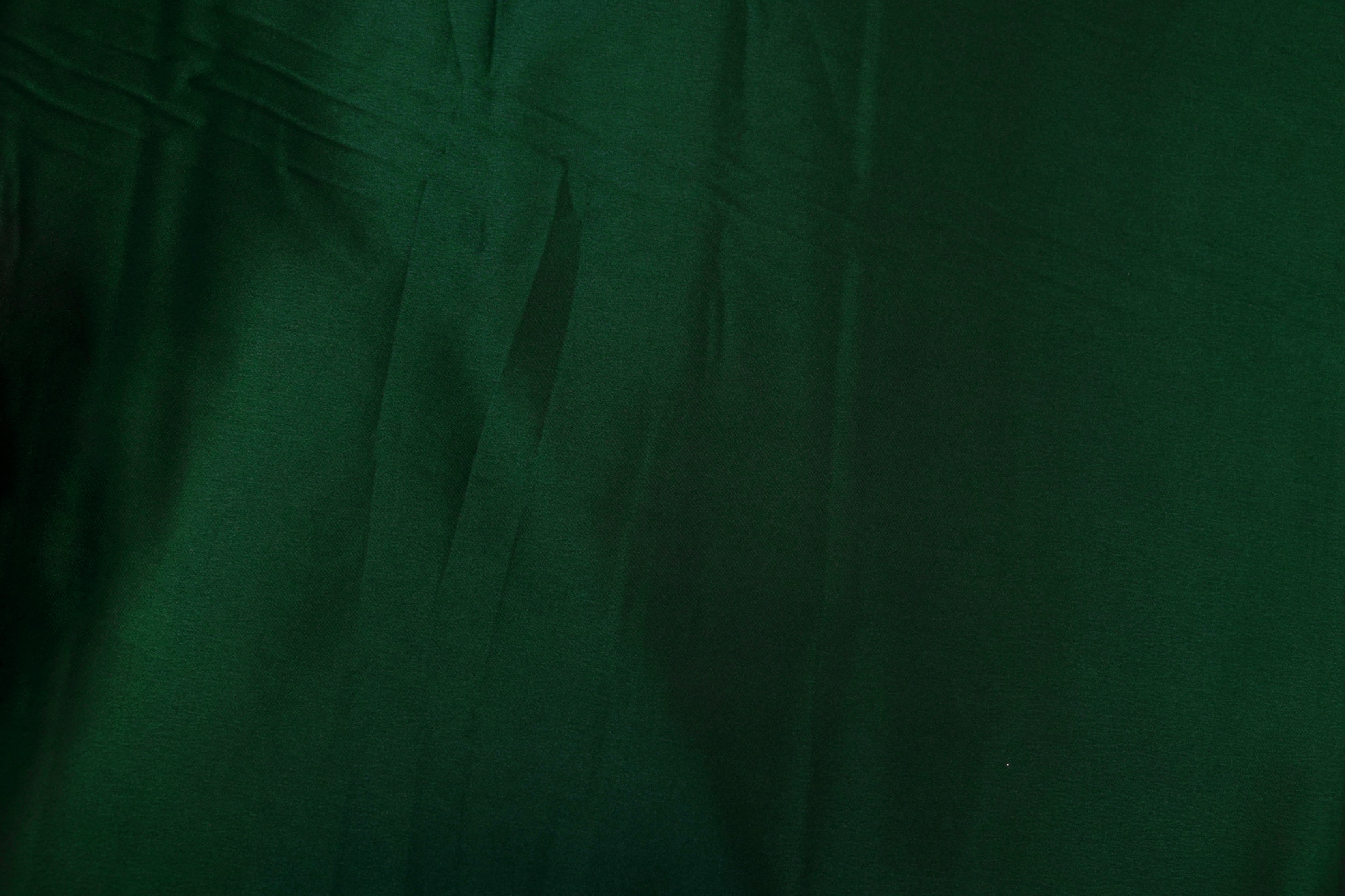 Dark jungle green colored royal satin