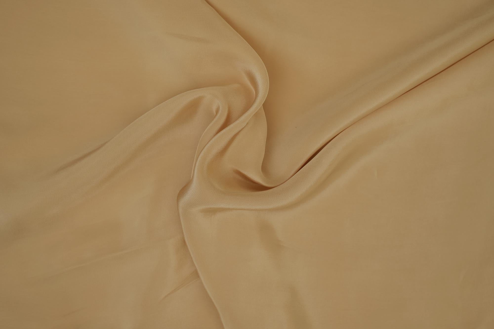 Desert sand coloured crepe fabric