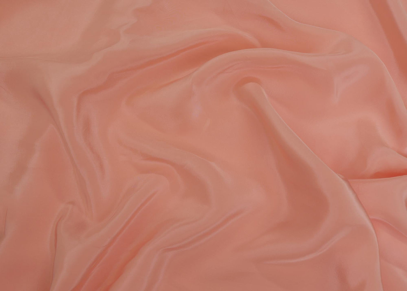 Coral coloured crepe fabric