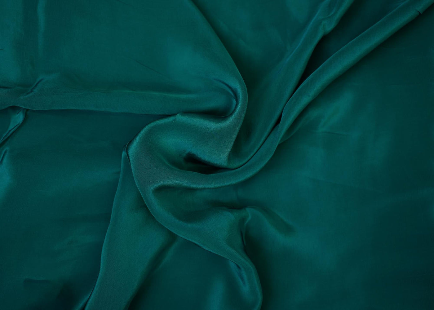 Rama green coloured crepe fabric