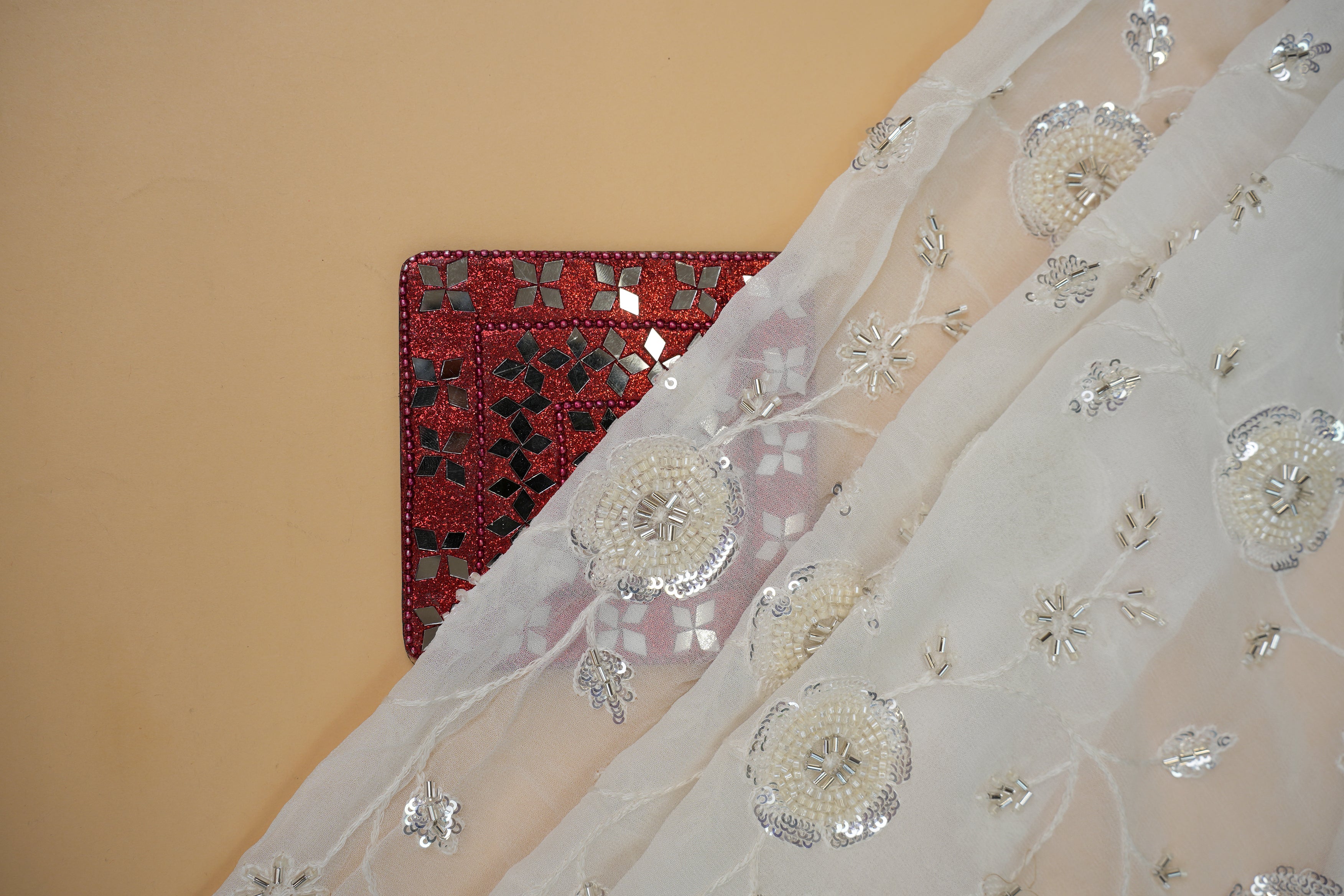 Embroided dyeable georgette fabric with beads , sequins and thread.