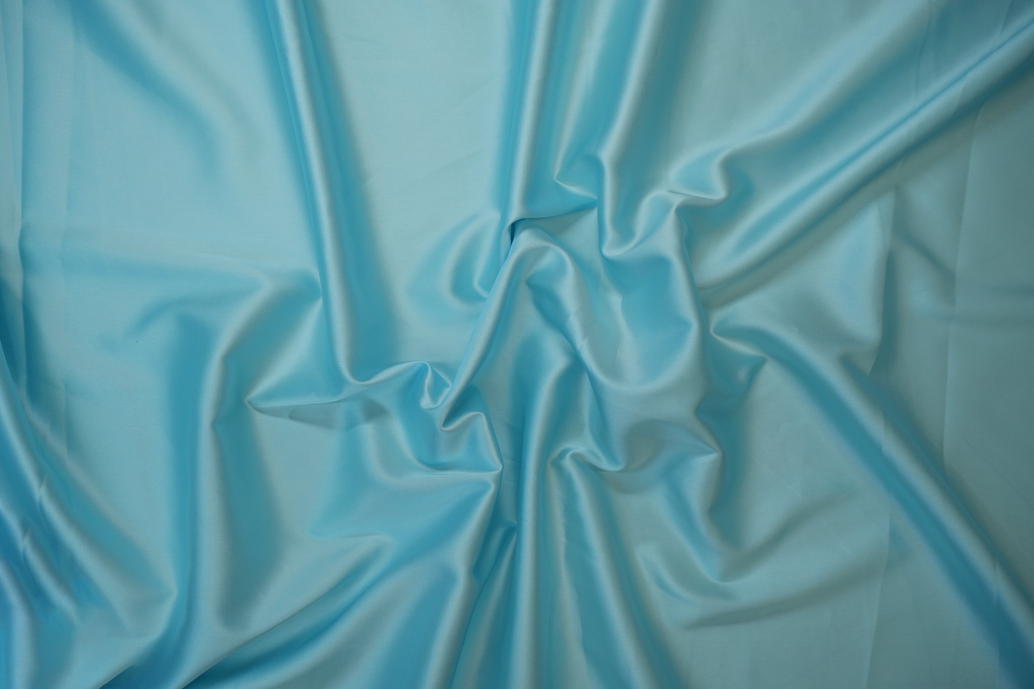 Aqua blue colored armani satin