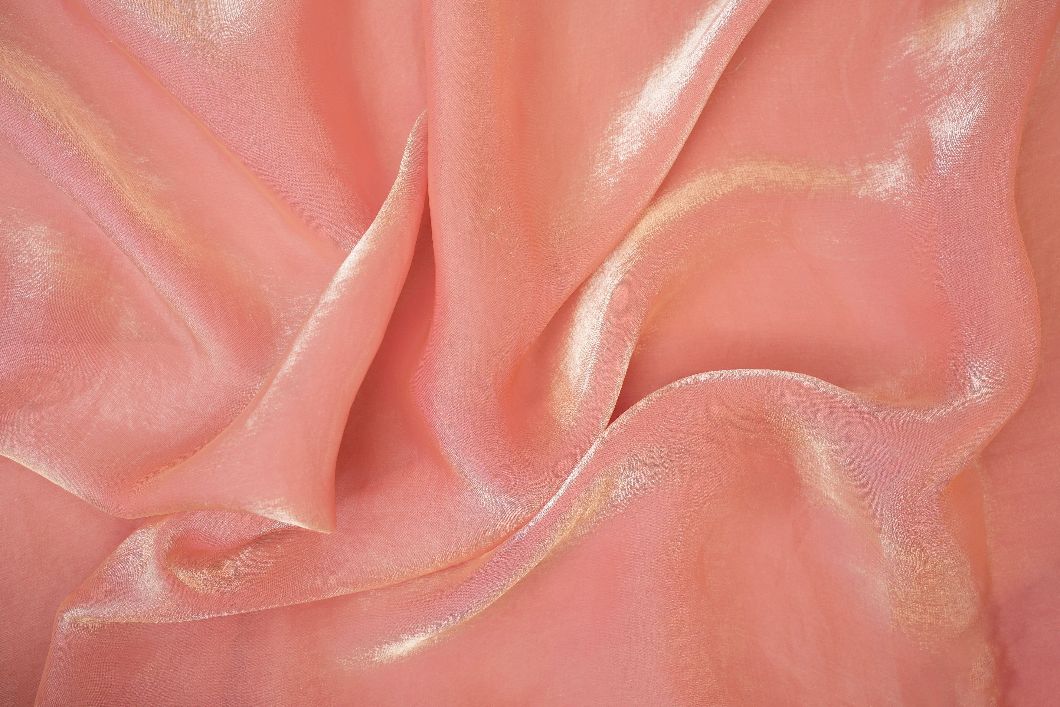 Peach pink coloured diamond tissue fabric