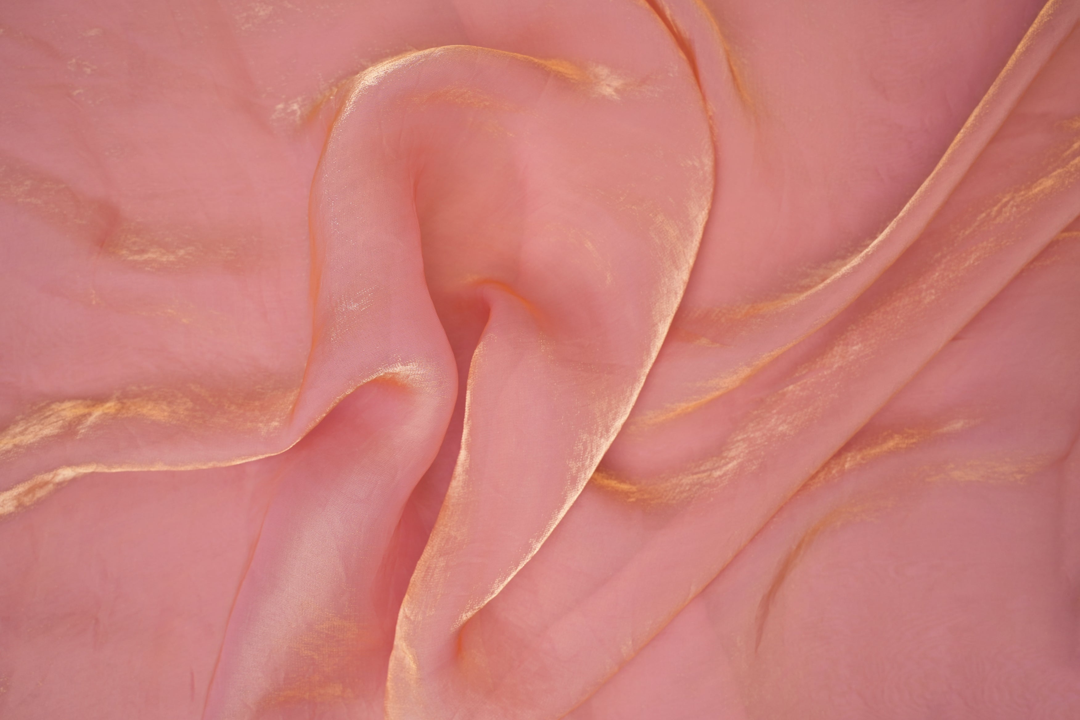 Peach pink coloured diamond tissue fabric