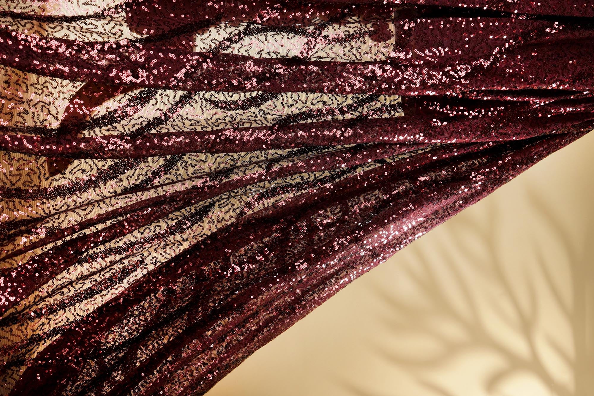 Maroon abstract pattern lycra net with all over sequins