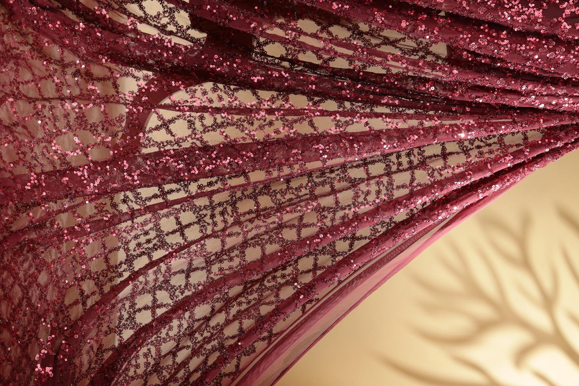 Maroon geometric pattern lycra net with sequins work