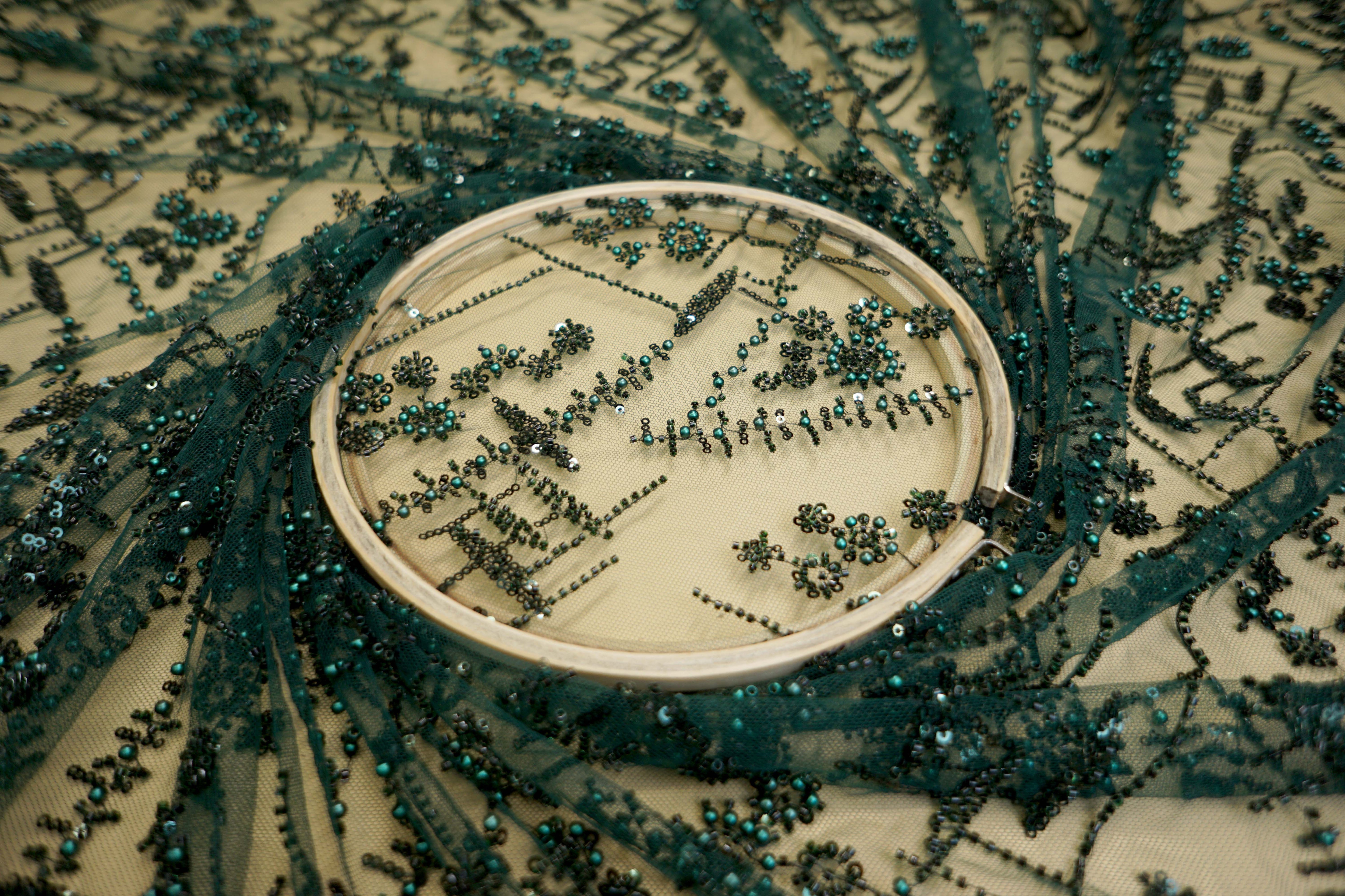 Bottle Green Net Adorned with Beads, Pearls, and Sequins