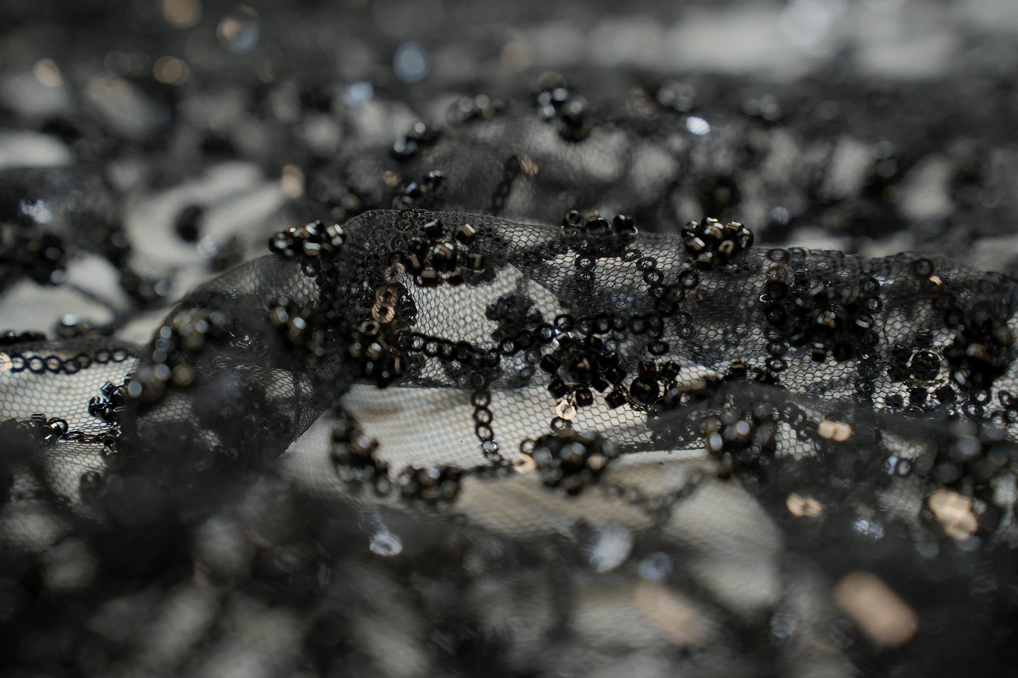 Black abstract pattern net with beads, pearls and sequins works