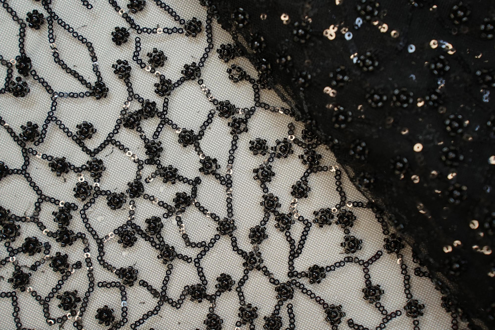 Black abstract pattern net with beads, pearls and sequins works