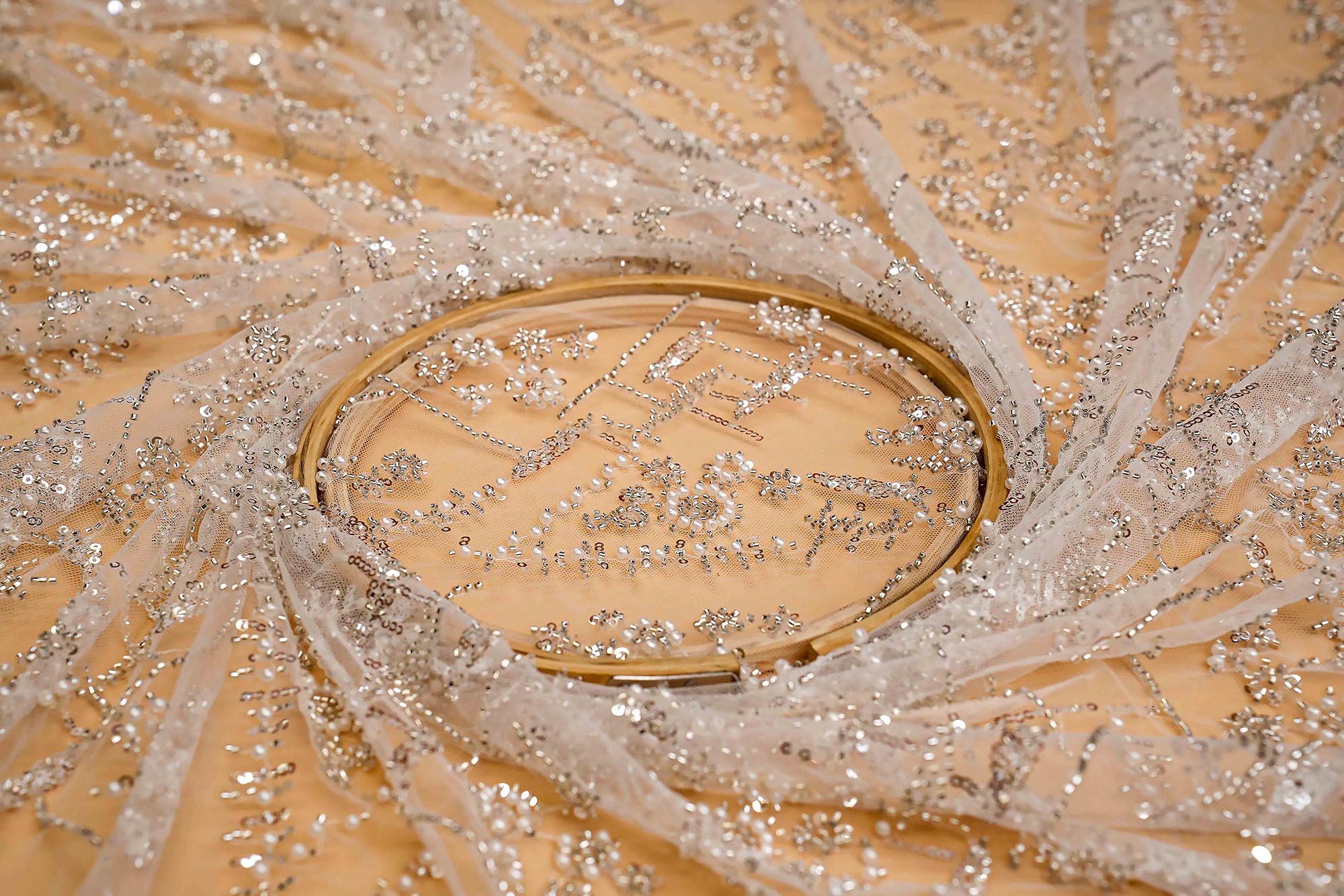 White Net Adorned with Beads, Pearls, and Sequins